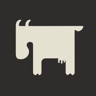 Silhouette of white goat with small horns standing sideways