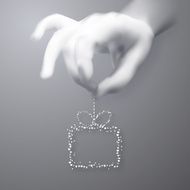 Human hand holding a gift N2