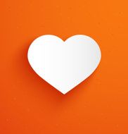 White paper heart on orange background N2