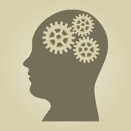 Human head silhouette with gears