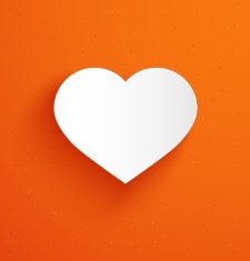 White paper heart on orange background N2
