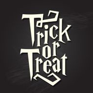 Trick or treat halloween quote on chalkboard