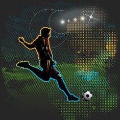 Football player shoots the ball