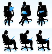 Businesswomen in office chairs