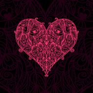 Abstract floral lace heart on a dark background