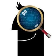 Head with magnifying glass and brain