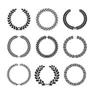 Black silhouettes of circular laurel foliate and wheat wreaths
