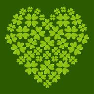 Heart with four leaf lucky clovers