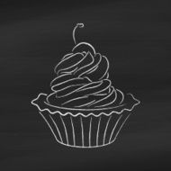 Cake on chalkboard background