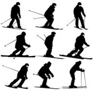 Mountain skier men and woman speeding down slope