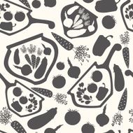 Vector seamless background with silhouettes of decorative vegetables