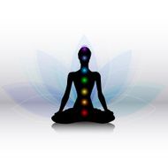 Yoga silhouette with chakras