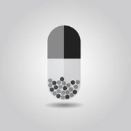 Close up of vertical capsule on gray background