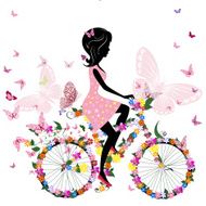 Girl on a bicycle with romantic butterflies