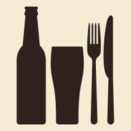 Bottle glass of beer and cutlery