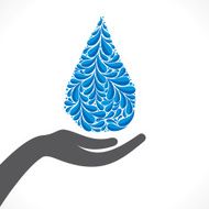 creative design of water drop in hand