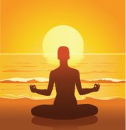 Meditating on the Beach at Sunset