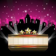 Marquee Sign in front of Cityscape