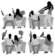 Couple sitting on sofa and watching football match