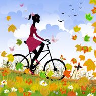 Girl on bike outdoors in autumn