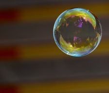 Colorful soap bubble in the top right corner