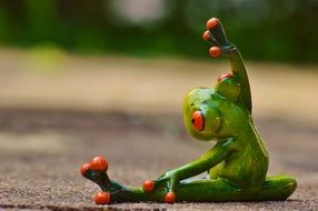 funny frog doing gymnastics