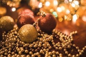 Christmas mood,Christmas garlands and balls lie in a pile