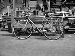 parked bike indoor, black and white