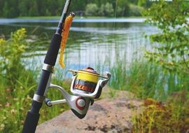 fishing equipment on the river bank