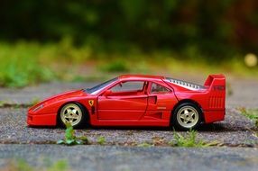 ferrari red car as a miniature model