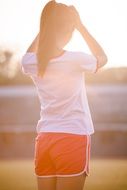 young girl with ponytail hair, back view
