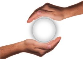ball between the hands of people