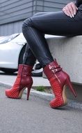 girl in red high-heeled shoes