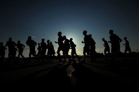 silhouettes of athlete runners