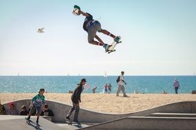 skaters on the beach