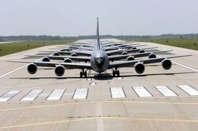 military aircraft on the runway in summer