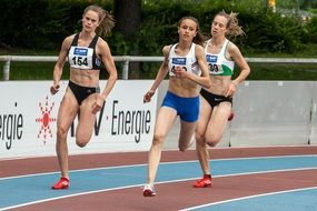 Athletes runners in the stadium