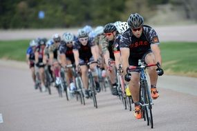 cyclists ride in a circle