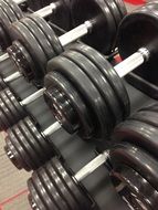 folded dumbbells in a fitness club