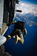 Military paratrooper in flight