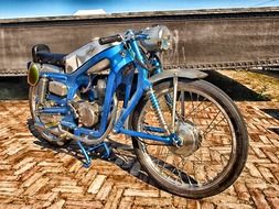 retro sporty blue bike on the promenade