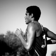black and white photo of a marathon runner
