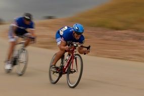 cyclists ride at speed