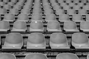 football audience with empty chairs
