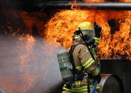 firefighter in helmet is training