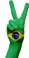 brazil flag victory sign on hand