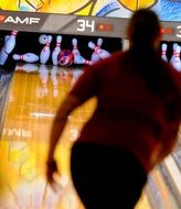 A girl in a bowling