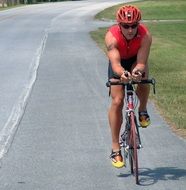 Cyclist on a empty road