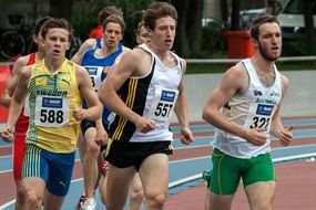 Runners at the stadium close-up