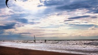 two kite surfers training at north sea coast